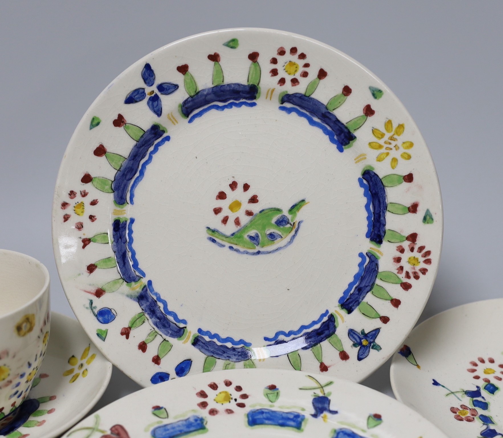 Jessie Marion King (1875-1949). Three different floral design tea cups, saucers and plates